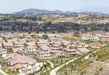 Image showing Contemporary Neighborhood and Majestic Clouds