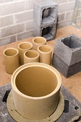 Image showing Construction of modular ceramic chimney in the house