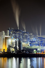 Image showing power station at night with smoke