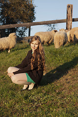 Image showing Young long-haired curly blonde woman