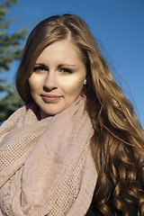 Image showing Young long-haired curly blonde woman