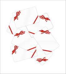 Image showing mess of white gift cards with red ribbon and bow