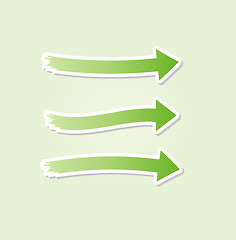 Image showing three different green arrows