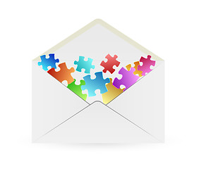 Image showing white envelope with puzzle pieces