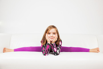 Image showing Cute little girl making splits