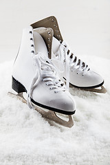 Image showing Ice skates with cap