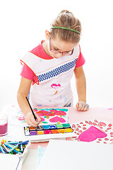 Image showing Schoolgirl painting