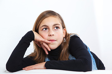 Image showing Portrait of schoolgirl thinking