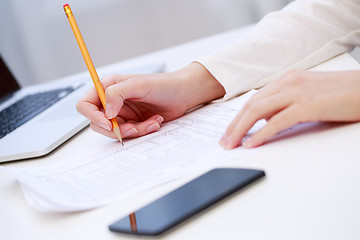 Image showing Female hand writing, close up