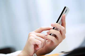 Image showing Woman using a mobile phone 