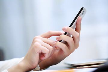 Image showing Woman using a mobile phone 