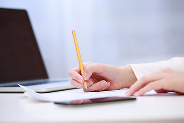 Image showing Female hand writing, close up