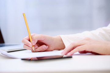 Image showing Female hand writing, close up