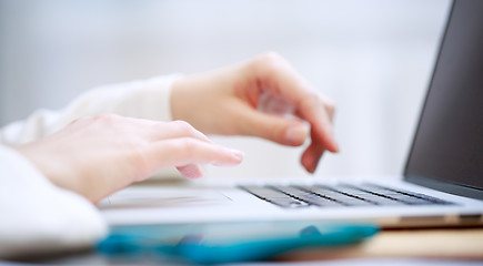 Image showing Close-up shot typing on the laptop keyboard