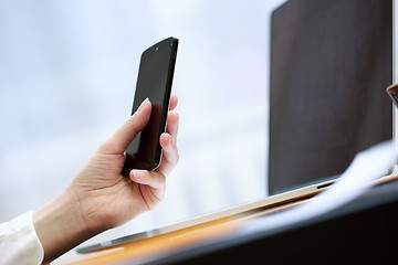 Image showing Woman using a mobile phone 