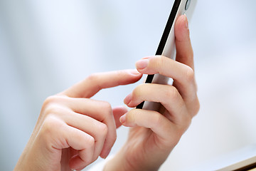 Image showing Woman using a mobile phone 