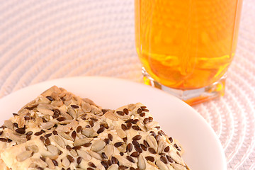 Image showing sweet cake on white plate with fresh juice