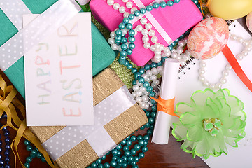 Image showing Easter background with eggs, ribbons and spring decoration