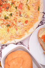 Image showing Beef pizza on white plate with red pepper