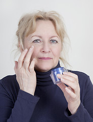 Image showing elderly woman with Wrinkle Cream