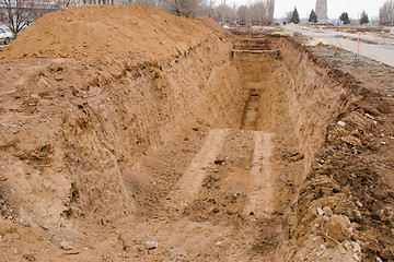 Image showing Dug a pit, trench