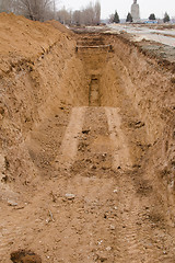 Image showing Dug a pit, trench