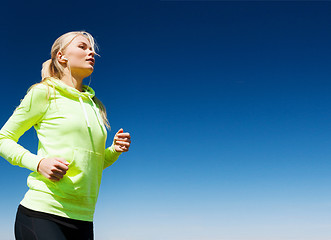 Image showing woman doing running outdoors