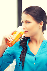 Image showing beautiful woman with glass of juice