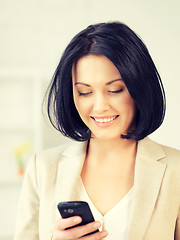 Image showing businesswoman with cell phone