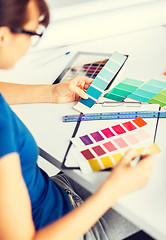 Image showing woman working with color samples for selection