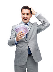 Image showing happy laughing businessman with euro money