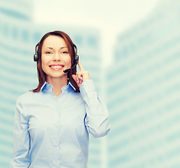 Image showing friendly female helpline operator