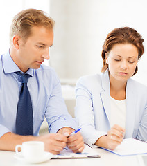 Image showing business team discussing something in office