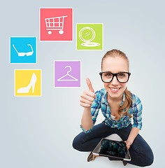 Image showing smiling woman with tablet pc computer at home