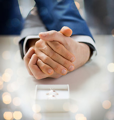 Image showing close up of male gay couple and wedding rings