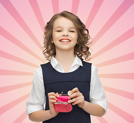 Image showing happy girl with purse and euro coin money