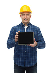 Image showing smiling male builder in helmet with tablet pc