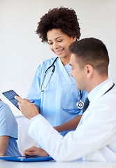 Image showing group of happy doctors meeting at hospital office