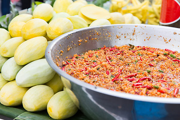 Image showing chilly wok or pilaf and mango at street market
