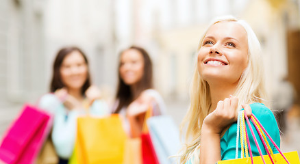 Image showing girls with shopping bags in ctiy