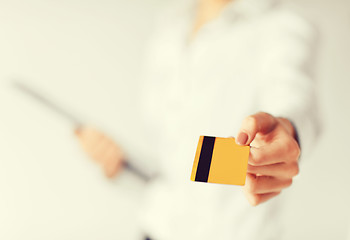 Image showing woman showing gold credit card