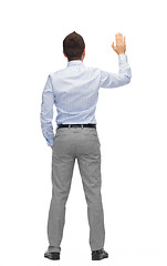 Image showing businessman waving hand