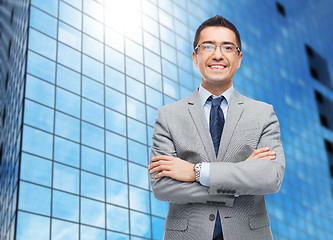 Image showing happy smiling businessman in eyeglasses and suit