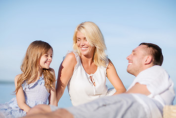 Image showing happy family having a picnic