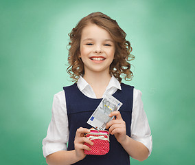 Image showing happy girl with purse and paper money