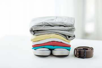 Image showing close up of clothes and accessories on table