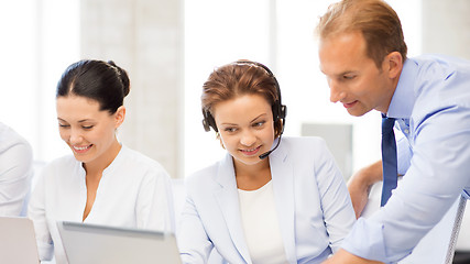 Image showing group of people working in call center