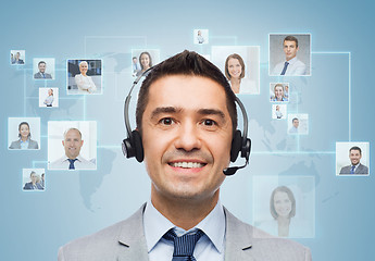 Image showing smiling businessman in headset