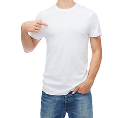 Image showing smiling young man in blank white t-shirt