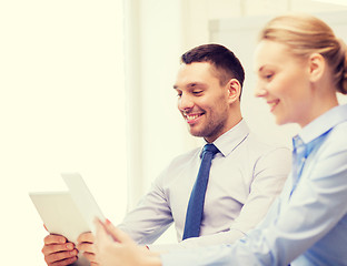 Image showing business team working with tablet pc in office